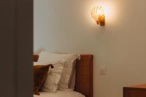 Ένα ή περισσότερα κρεβάτια σε δωμάτιο στο Prestigieux T4 à rue Sainte by Maison Galante