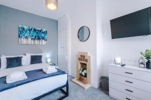 Ένα ή περισσότερα κρεβάτια σε δωμάτιο στο Serene & Contemporary Hoole House