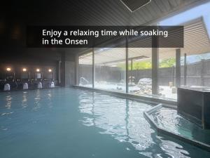 Bazén v ubytování KAMENOI HOTEL Okunikko nebo v jeho okolí