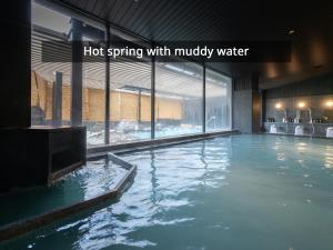 Bazén v ubytování KAMENOI HOTEL Okunikko nebo v jeho okolí