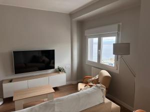 TV a/nebo společenská místnost v ubytování Piso a pie de playa