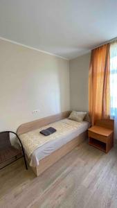 Postel nebo postele na pokoji v ubytování Baltcity