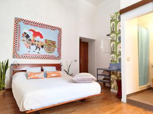 Postel nebo postele na pokoji v ubytování Babbo Guest House