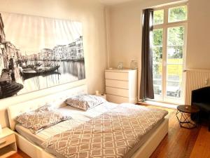 Postel nebo postele na pokoji v ubytování Doppelzimmer mit Terrasse in privatem Zuhause