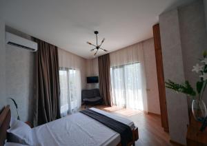Postel nebo postele na pokoji v ubytování Labu Hotel