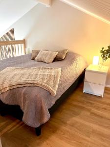 Ένα ή περισσότερα κρεβάτια σε δωμάτιο στο Kalliotupa