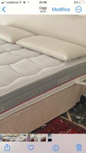A bed or beds in a room at Attico San Francesco