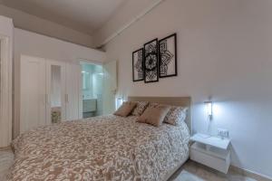 Un pat sau paturi într-o cameră la Nest 27