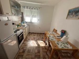 Kuchyňa alebo kuchynka v ubytovaní Apartment MIP