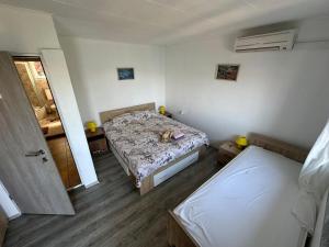 Posteľ alebo postele v izbe v ubytovaní Apartment MIP