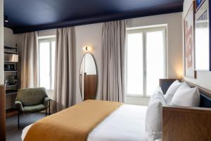 Postel nebo postele na pokoji v ubytování Hôtel Gabbie + 24 fotografií