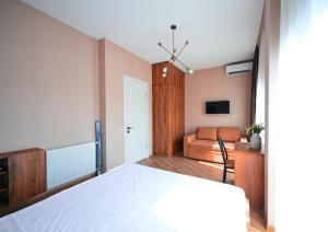 Postel nebo postele na pokoji v ubytování Labu Hotel