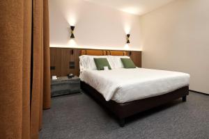 Postel nebo postele na pokoji v ubytování Best Western Hotel Biri