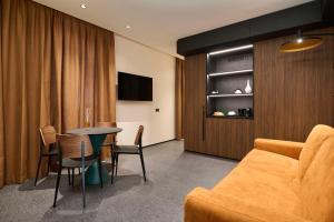 TV a/nebo společenská místnost v ubytování Best Western Hotel Biri