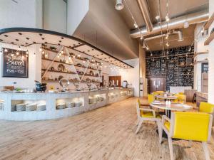 Posezení v ubytování Ibis Styles Dragon Mart Dubai