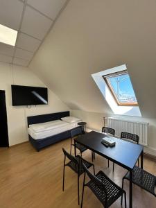 TV a/nebo společenská místnost v ubytování Powder Tower Suites