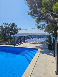 Bazén v ubytování Beachfront House Ivana with Pool - renovated 2025 nebo v jeho okolí