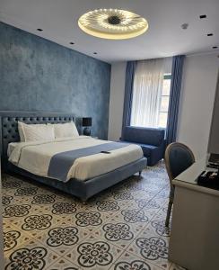 Postel nebo postele na pokoji v ubytování Casa Reale Boutique Hotel