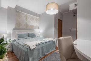 Cama o camas de una habitación en Sultan Modern Hotel