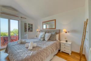 Posteľ alebo postele v izbe v ubytovaní Villa Kentia Mallorca, charming and stylish country house close to Palma