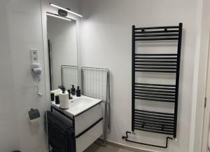 Kúpeľňa v ubytovaní Réz Apartmanok Gyula