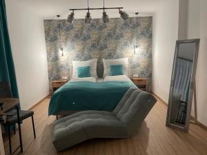 Posteľ alebo postele v izbe v ubytovaní Réz Apartmanok Gyula