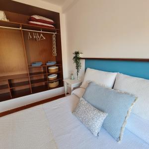 Łóżko lub łóżka w pokoju w obiekcie Casa M de mar - Dúplex con vistas