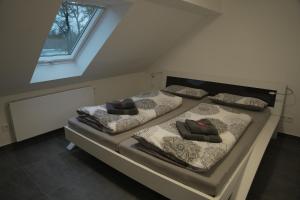 Ένα ή περισσότερα κρεβάτια σε δωμάτιο στο Luxury Apartment Weingarten