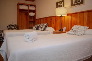 Postel nebo postele na pokoji v ubytování Hotel Solar d'Izabel