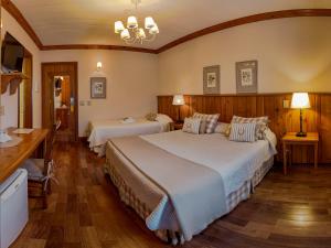 Postel nebo postele na pokoji v ubytování Hotel Solar d'Izabel