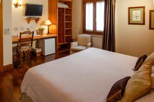Postel nebo postele na pokoji v ubytování Hotel Solar d'Izabel