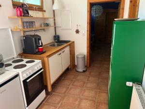 Η κουζίνα ή μικρή κουζίνα στο Kleine Wohnung auf dem Land