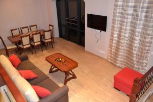 TV a/nebo společenská místnost v ubytování Villadzor Apart Hotel