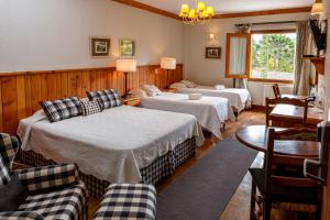 Postel nebo postele na pokoji v ubytování Hotel Solar d'Izabel
