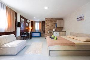 Postel nebo postele na pokoji v ubytování Apartments Obala