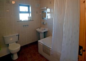 Koupelna v ubytování Station House