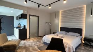 Posteľ alebo postele v izbe v ubytovaní BUNASTA Apartments