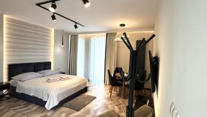 Posteľ alebo postele v izbe v ubytovaní BUNASTA Apartments