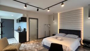Posteľ alebo postele v izbe v ubytovaní BUNASTA Apartments