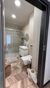 Kúpeľňa v ubytovaní BUNASTA Apartments