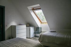 Postel nebo postele na pokoji v ubytování Pils