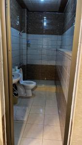 Koupelna v ubytování جرش سوف + 5 fotografií