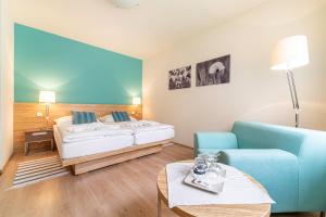Posteľ alebo postele v izbe v ubytovaní Hotel Vyhlídka