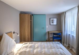 Letto o letti in una camera di Gasthof Löwen Tosters