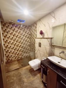 Koupelna v ubytování Hotel Waterfall Paschim Vihar Delhi