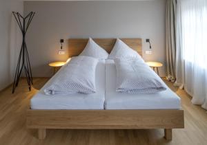 Letto o letti in una camera di Gasthof Löwen Tosters