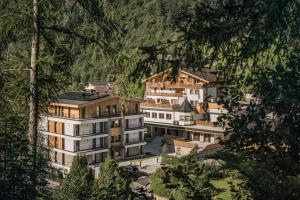 a group of buildings in a mountain village at Resort Schrofenblick in Mayrhofen