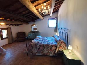 Ένα ή περισσότερα κρεβάτια σε δωμάτιο στο Agriturismo Campo alla Cantina appartamento Sulla