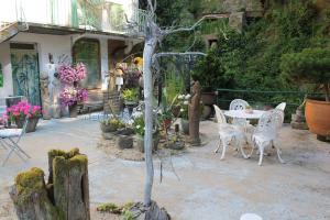 Zahrada ubytování Chambre Bounty, B&B, cuisine privée, lit queen size, terrasse, parking, garage