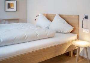 Letto o letti in una camera di Gasthof Löwen Tosters